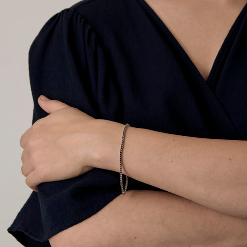 Bracelet Bracelet en or blanc et diamants noirs 58 Facettes DV28121-1
