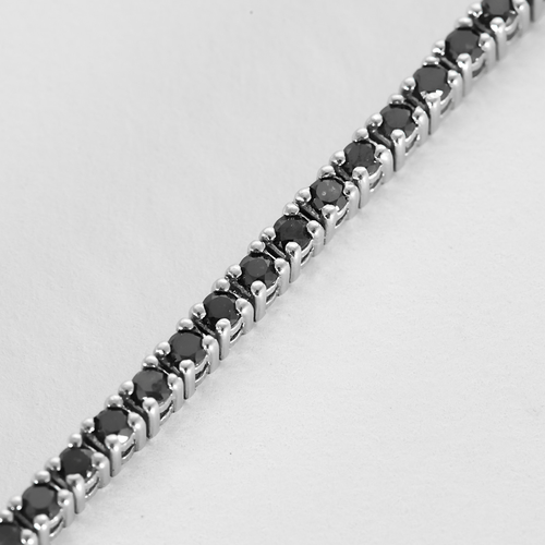 Bracelet Bracelet en or blanc et diamants noirs 58 Facettes DV28121-1