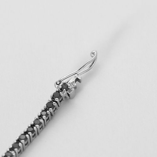 Bracelet Bracelet en or blanc et diamants noirs 58 Facettes DV28121-1