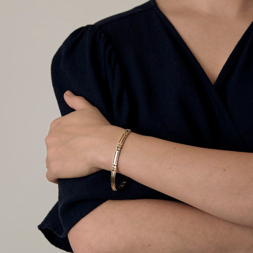 Bracelet Bracelet de type gourmette en or blanc et or jaune 58 Facettes DV15012-3