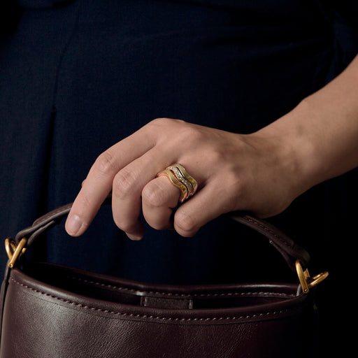 Bague 52 CARTIER - Neptune - Vintage - Bague trois anneaux or jaune, or gris et diamants 58 Facettes DV28241-2