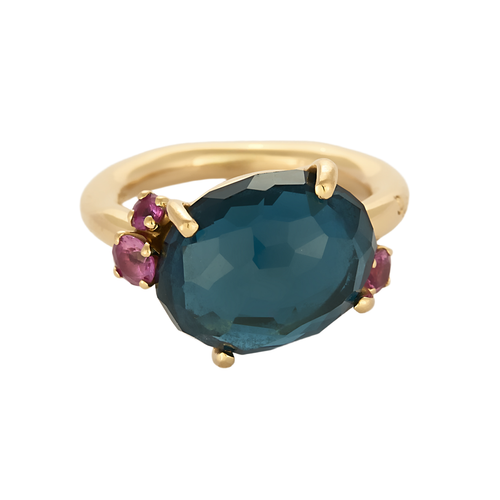 Pomellato - Bahia - Bague or rose topaze bleu et saphirs roses facettés.