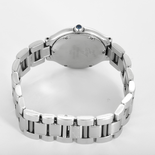 Montre Cartier - Must - Montre en acier à mouvement quartz et boitier rond 58 Facettes DV27342-10