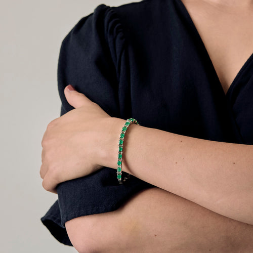 Attribué à STERN - Bracelet en or gris, émeraudes et diamants