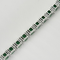 Attribué à STERN - Bracelet en or gris, émeraudes et diamants