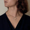 Pendentif DINH VAN - Impression - Pendentif en or gris 58 Facettes DV18596-5