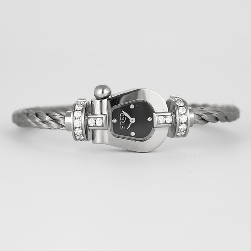 FRED - Montre de dame en acier à boitier en forme de manille et diamants