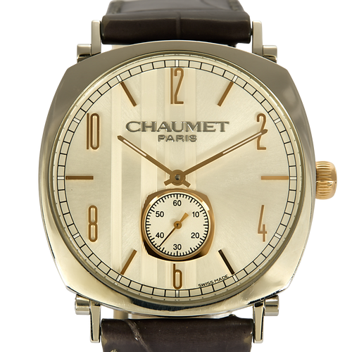 CHAUMET - DANDY - Montre en acier, acier doré à boitier tonneau et à mouvement mécanique