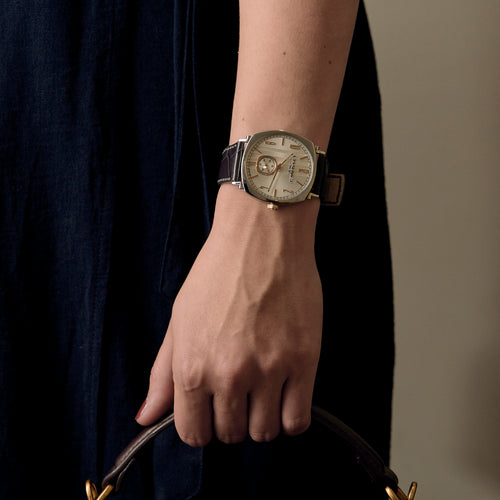 CHAUMET - DANDY - Montre en acier, acier doré à boitier tonneau et à mouvement mécanique