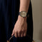 CHAUMET - DANDY - Montre en acier, acier doré à boitier tonneau et à mouvement mécanique