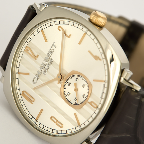 CHAUMET - DANDY - Montre en acier, acier doré à boitier tonneau et à mouvement mécanique