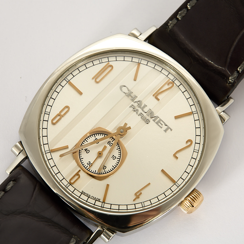 CHAUMET - DANDY - Montre en acier, acier doré à boitier tonneau et à mouvement mécanique