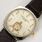 CHAUMET - DANDY - Montre en acier, acier doré à boitier tonneau et à mouvement mécanique