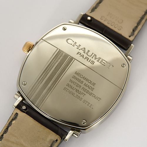 CHAUMET - DANDY - Montre en acier, acier doré à boitier tonneau et à mouvement mécanique