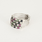 Bague harem en or gris 14K diamants, rubis et emeraudes