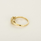 Bague type solitaire en or jaune, diamant natural fancy yellow 0.79 carat et petits diamants blancs