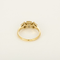 Bague type solitaire en or jaune, diamant natural fancy yellow 0.79 carat et petits diamants blancs