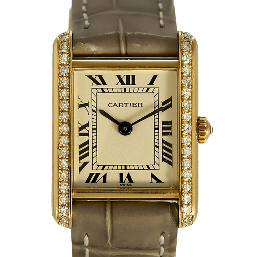 Montre Cartier Montre Tank en or jaune et diamants 58 Facettes DV31731-1
