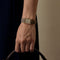 Cartier Montre Tank en or jaune et diamants 58 Facettes DV31731-1