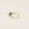 Bague en or blanc ornée d’un rubis de 1,50 carat, épaulé de diamants pour 0,12 carat au total