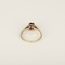 Bague en or blanc ornée d’un rubis de 1,50 carat, épaulé de diamants pour 0,12 carat au total