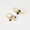 Boucles d'oreilles en or jaune, citrines, améthystes, péridots et onyx.