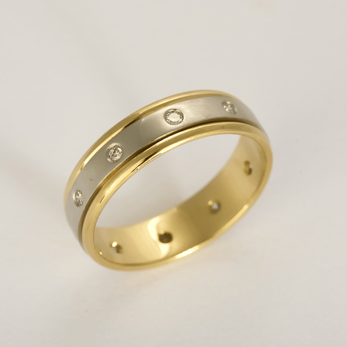 Bague 61 Élégante bague jonc en or jaune et or blanc, diamants : 0,45 carat 58 Facettes DV32130-1