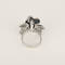 Bague 53 Élégante bague en or blanc 18K (750 millièmes) à motif d’orchidée, saphirs et diamants 58 Facettes DV0156-7