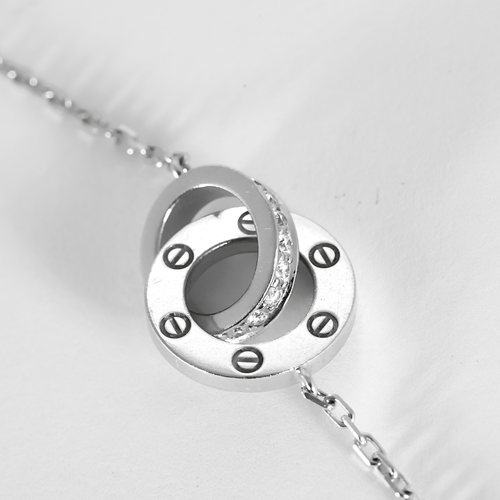 CARTIER – LOVE, PAVÉ – Élégant collier en or blanc et diamants 58 Facettes DV32231-2
