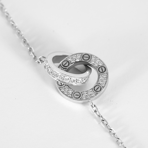 CARTIER – LOVE, PAVÉ – Élégant collier en or blanc et diamants 58 Facettes DV32231-2