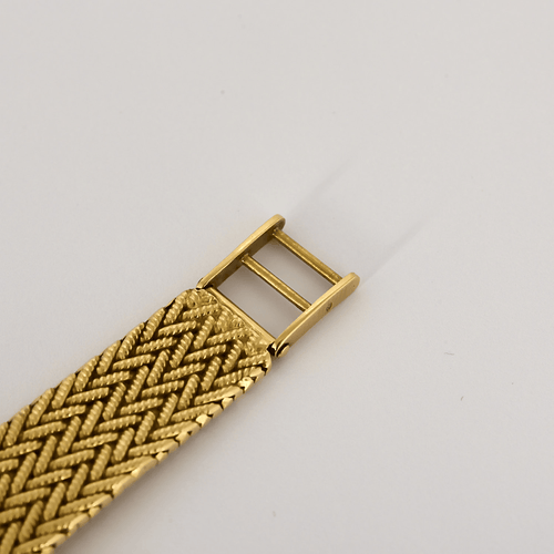 Patek Philippe Montre Ellipse Ladie's en or jaune et cadran onyx 58 Facettes DV31835-1