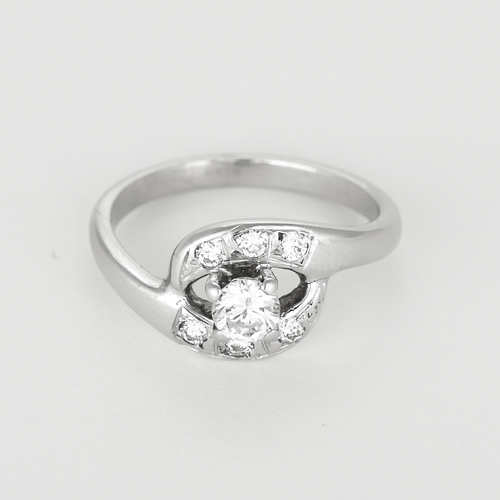 50 Bague volute en or gris et diamants 58 Facettes DV32697-1
