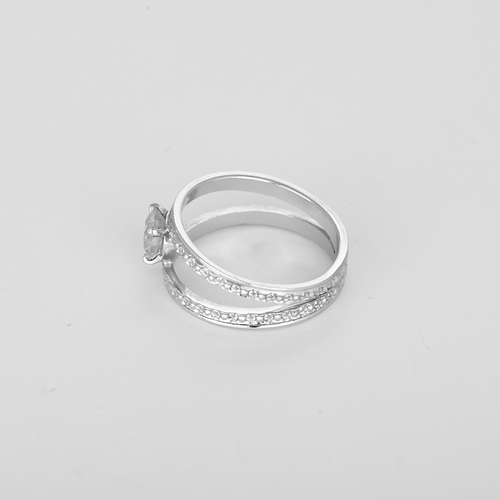 Bague en or gris double jonc et diamant