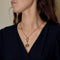 Collier Bulgari Astrale en or jaune et céramique 58 Facettes DV33076-2