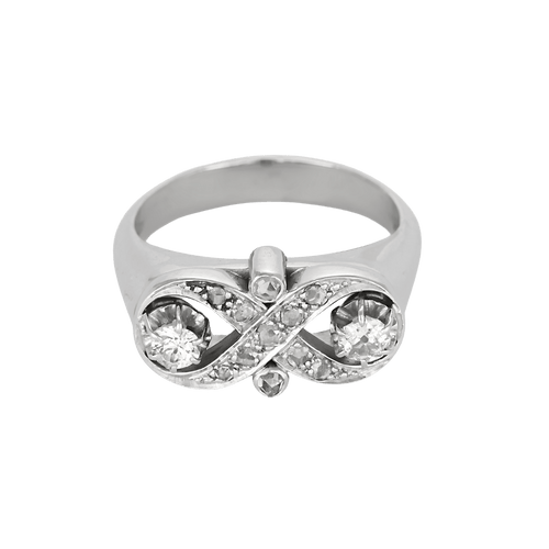 Charmante Bague en or gris et diamants.