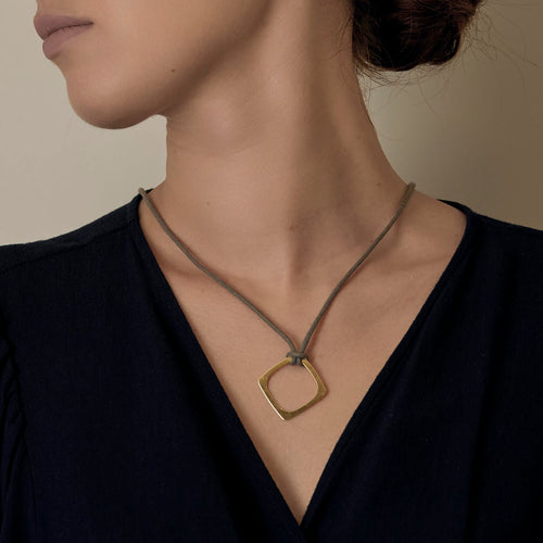 Dinh Van - Impression - Collier en or jaune, cordon gris 58 Facettes DV33869-3