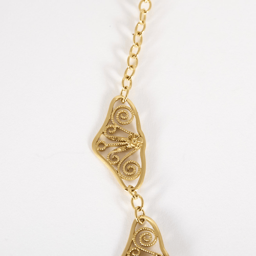 Élégant collier draperie en or jaune 58 Facettes DV33744-6