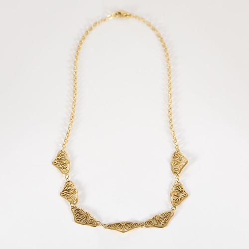 Élégant collier draperie en or jaune 58 Facettes DV33744-6
