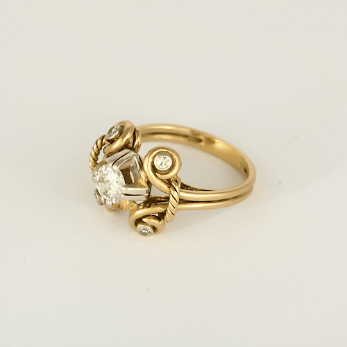 54 Élégante bague en or jaune, platine et diamants : 0,80 carat 58 Facettes DV34030-17