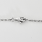 Chanel - Camélia - Collier en or blanc, diamants : 0,20 carat et onyx 58 Facettes DV33076-6