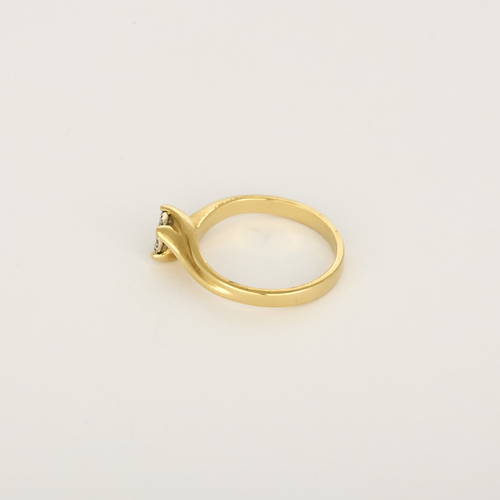 Bague Solitaire en or jaune, or blanc et diamants : 0,14 carat