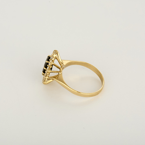 51 Bague marguerite en or jaune, diamants et saphir 58 Facettes DV34627-1