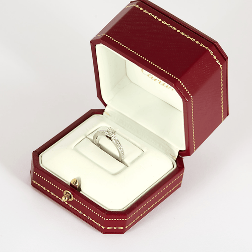 51 Cartier - Solitaire 1895" - Bague platine et diamant 0.58 carat 58 Facettes DV34485-1