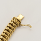Bracelet en or jaune à maille gourmette plate