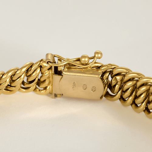 Bracelet en or jaune à maille gourmette plate