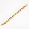 Bracelet en or jaune à maillons ovales entrelacés 58 Facettes DV34119-2