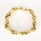 Bracelet en or jaune à maillons ovales entrelacés 58 Facettes DV34119-2