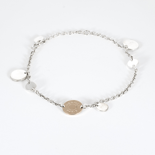 HERMES - Ex-Libris - Bracelet en argent et or rose