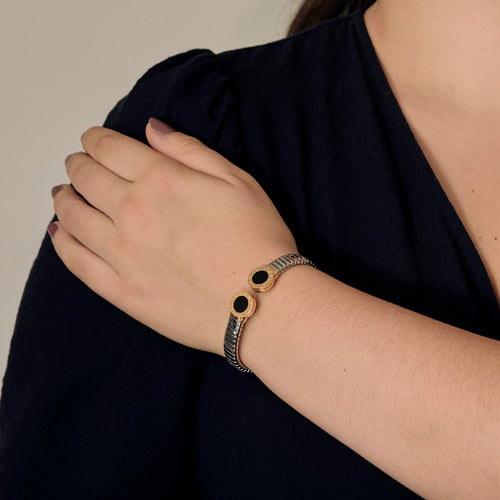 Bracelet Bracelet Bulgari, "Bulgari-Bulgari" Bracelet en acier, or jaune et onyx 58 Facettes DV32159-1