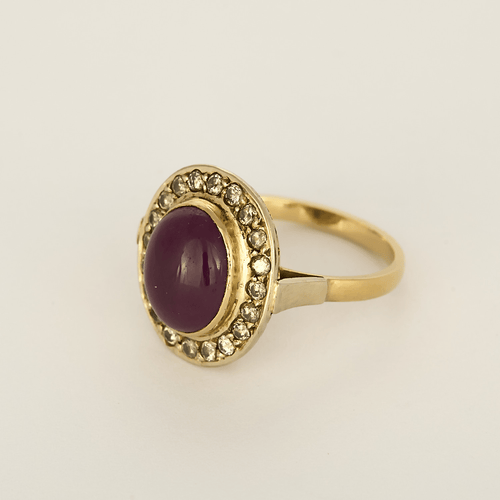 Bague 54 Bague en or jaune et or gris, rubis cabochon et diamants 58 Facettes DV32363-6